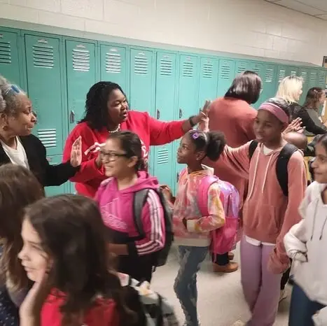 JCPS middle school students walking down the school's hallway